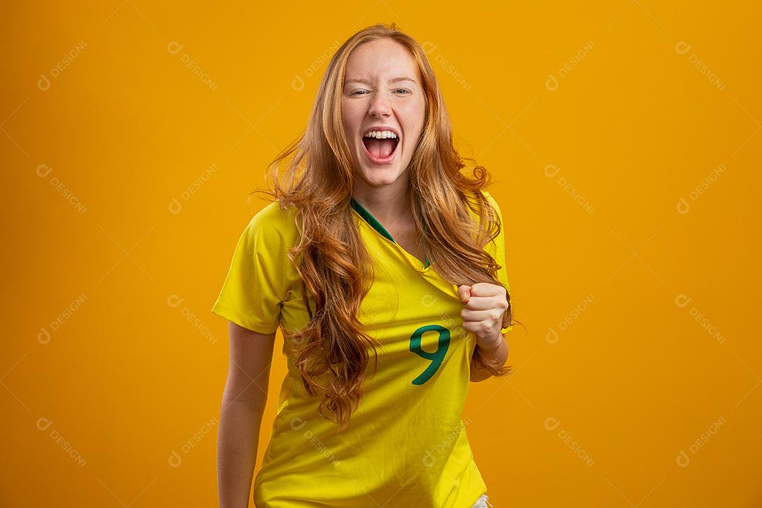 Brazil fan. Brazilian redhead fan celebrating