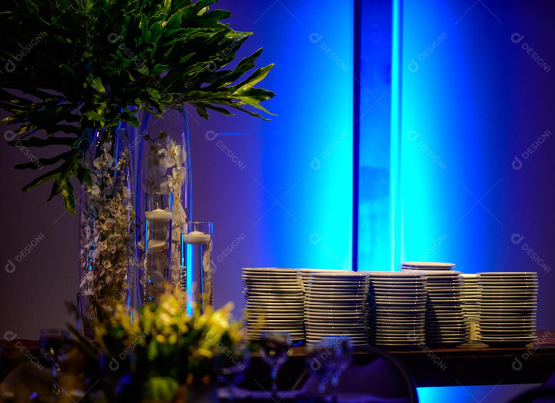 table in a ballroom, all lit up and with a centerpiece