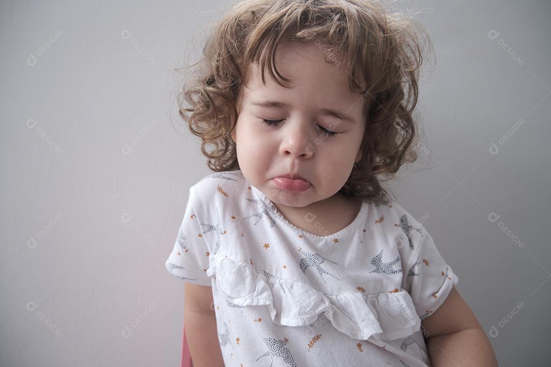 Brazilian girl making a sad face for the camera