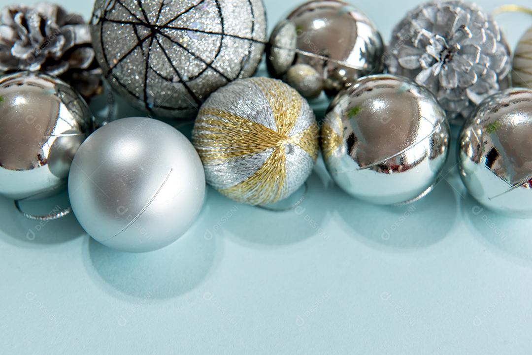 Christmas baubles and decorations on a blue background