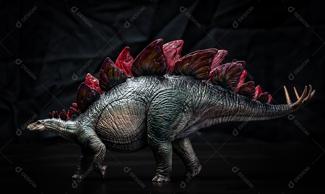 Dinosaur, stegosaurus in the dark