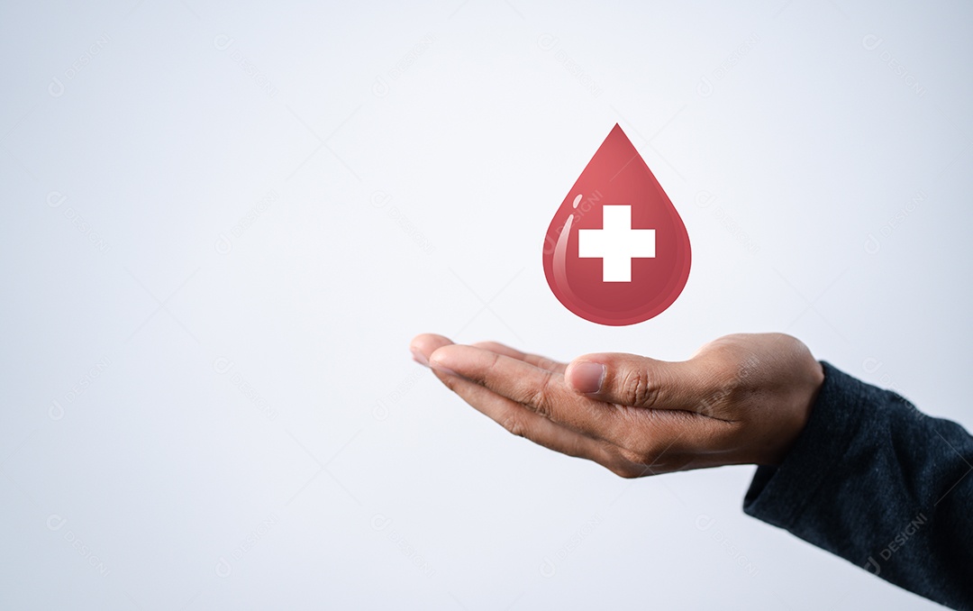 M茫os de homem segurando um 铆cone virtual de sangue de doa莽茫o, transfus茫o de sangue, dia mundial do doador de sangue