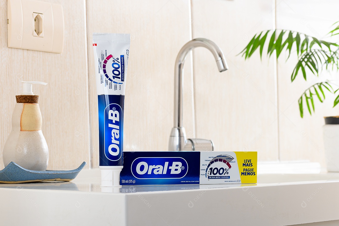 Oral cream boxes b on bench of a bathroom