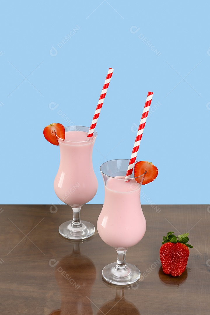 Two shot glasses with strawberry