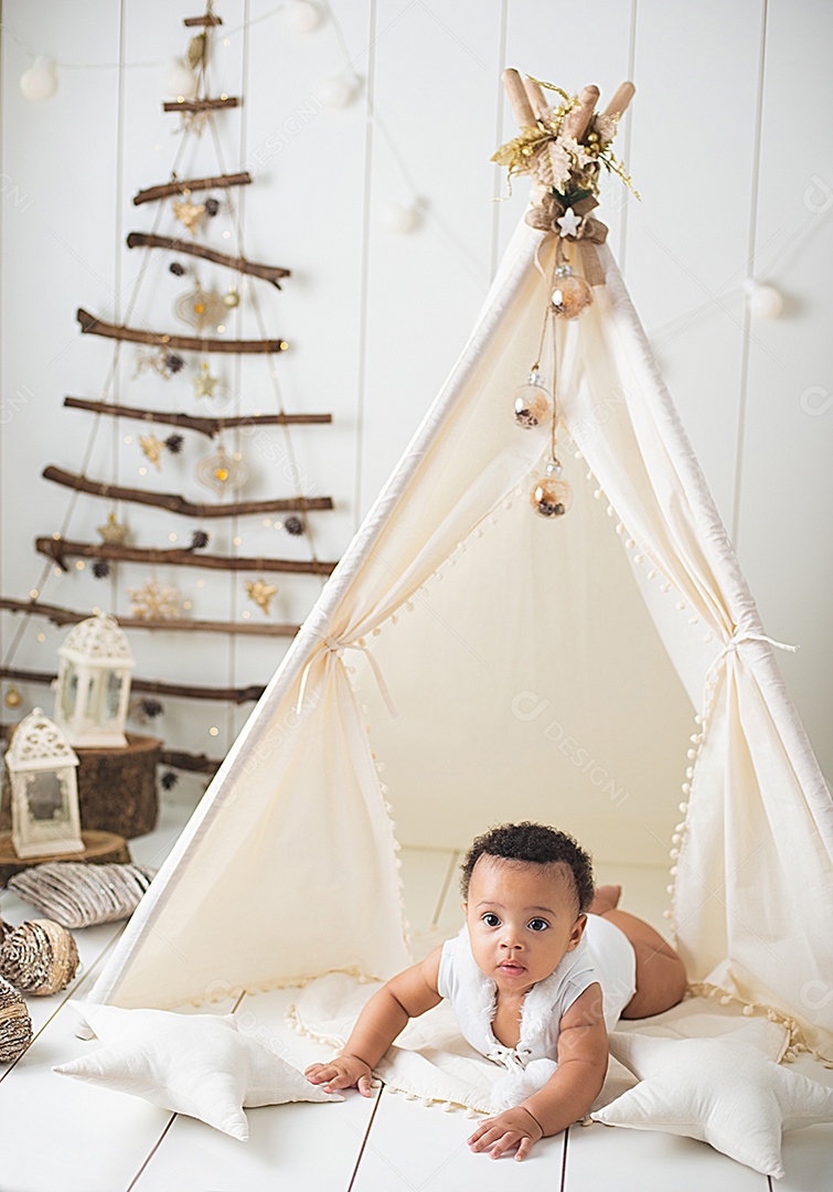 A beautiful baby in the Christmas decoration touch