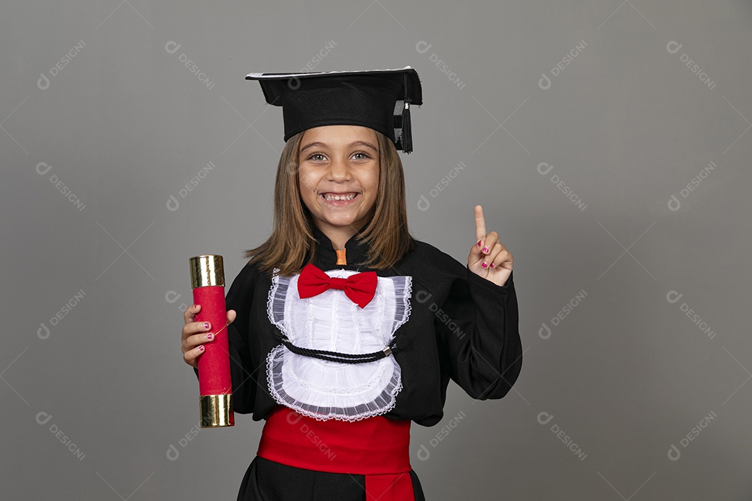 Beautiful girl wearing graduation clothes