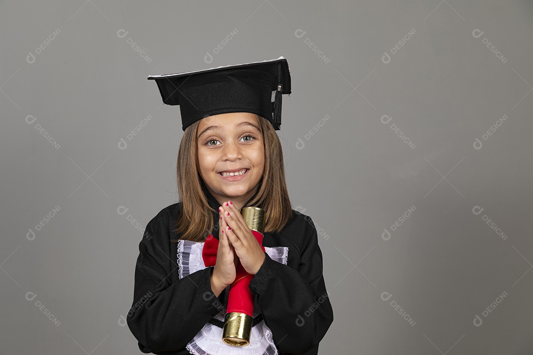 Beautiful girl with hands given thanking using graduation beca