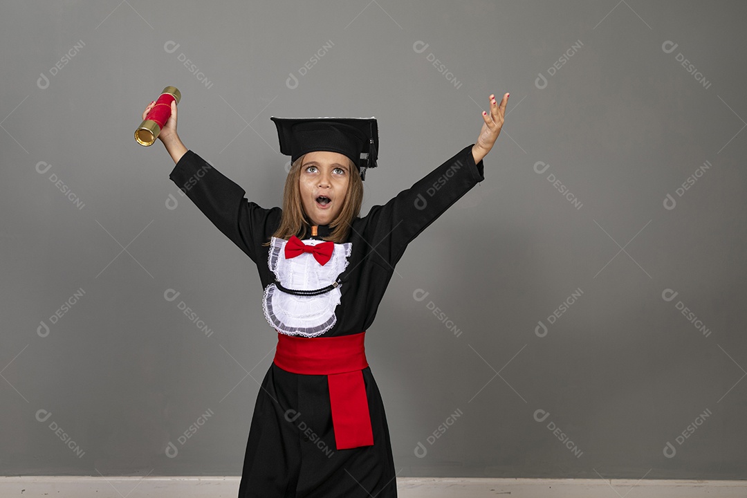 Happy little girl in child graduation