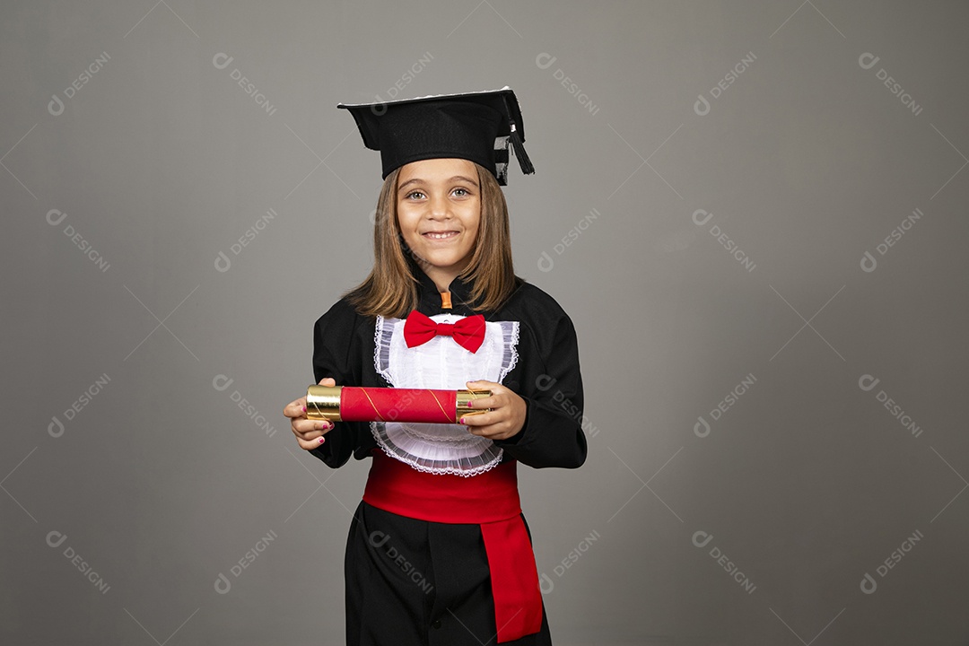 Beautiful little girl with graduation clothes