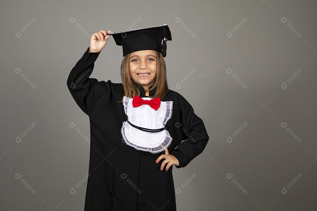 Beautiful girl wearing graduation clothes