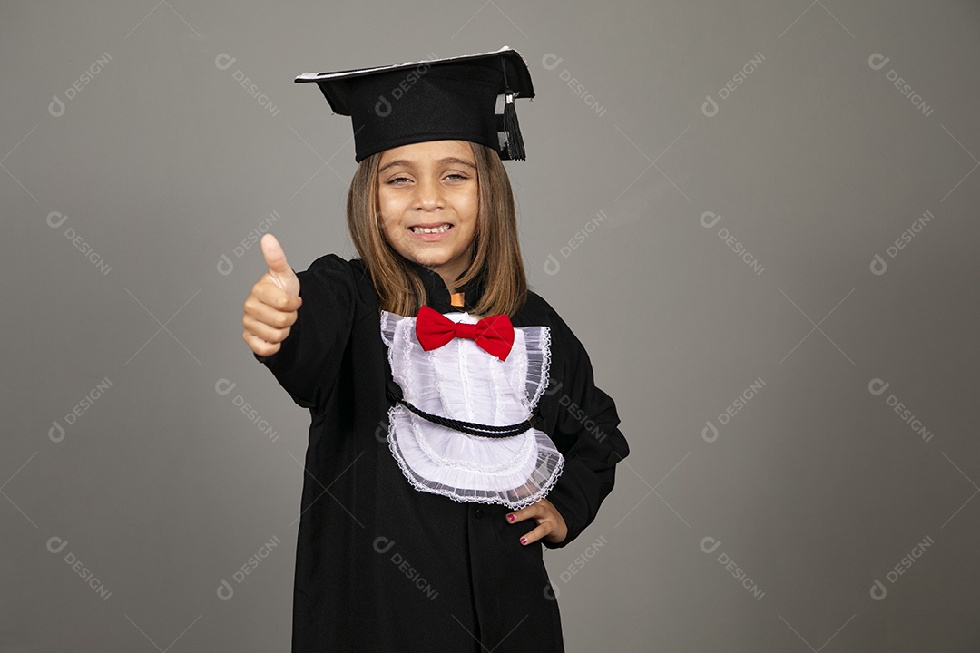 Beautiful girl using beak in a graduation