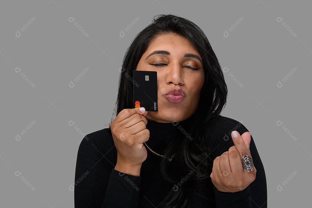 Woman with happy pose holding credit card on hands