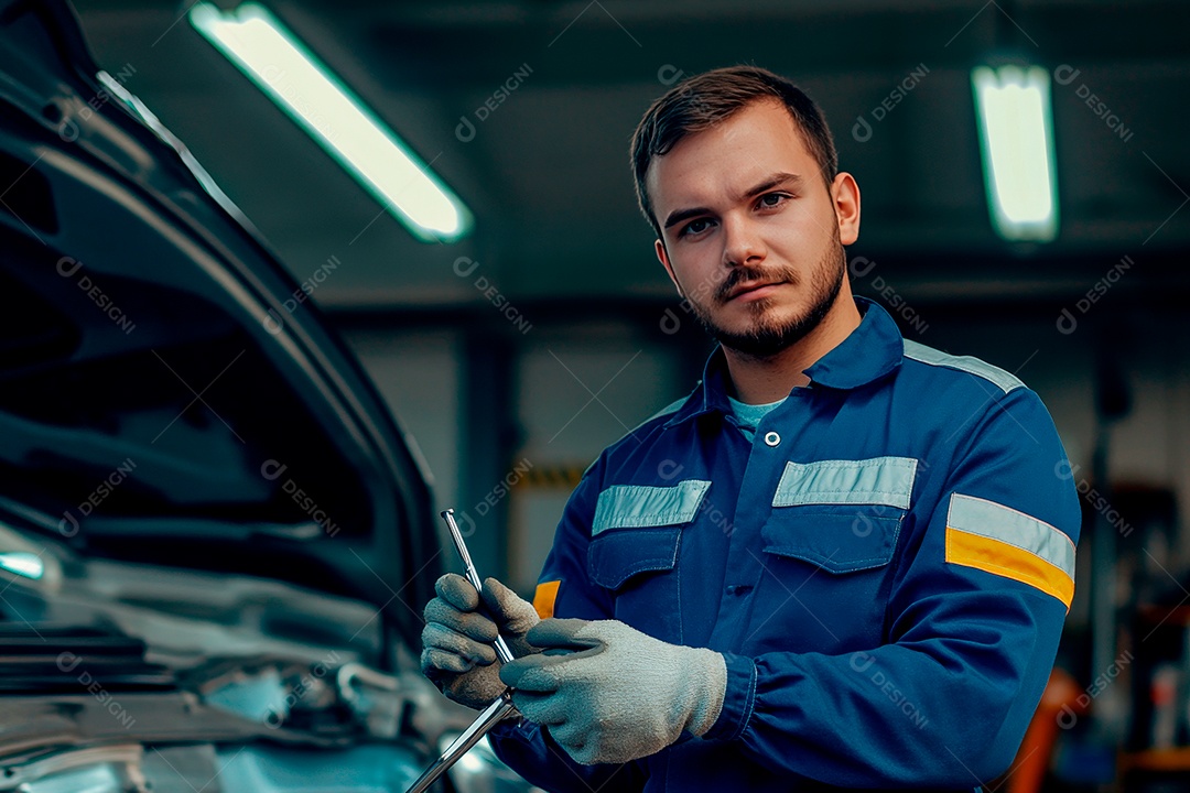 Young mechanical man on workshop